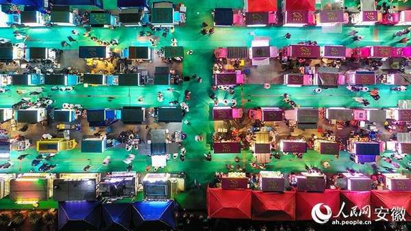 新春走基层武冈(新春走基层丨“芒果夜市”升腾的年味)